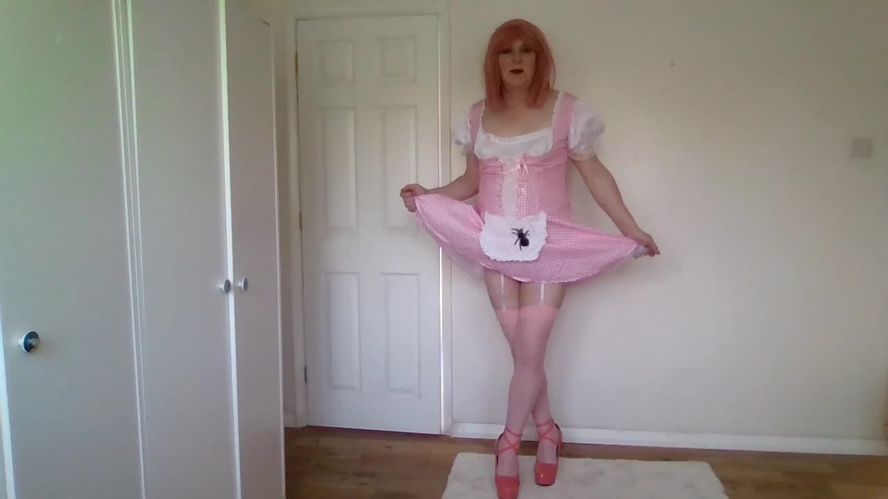 Pink and white uniform with pink high heels and white lingerie